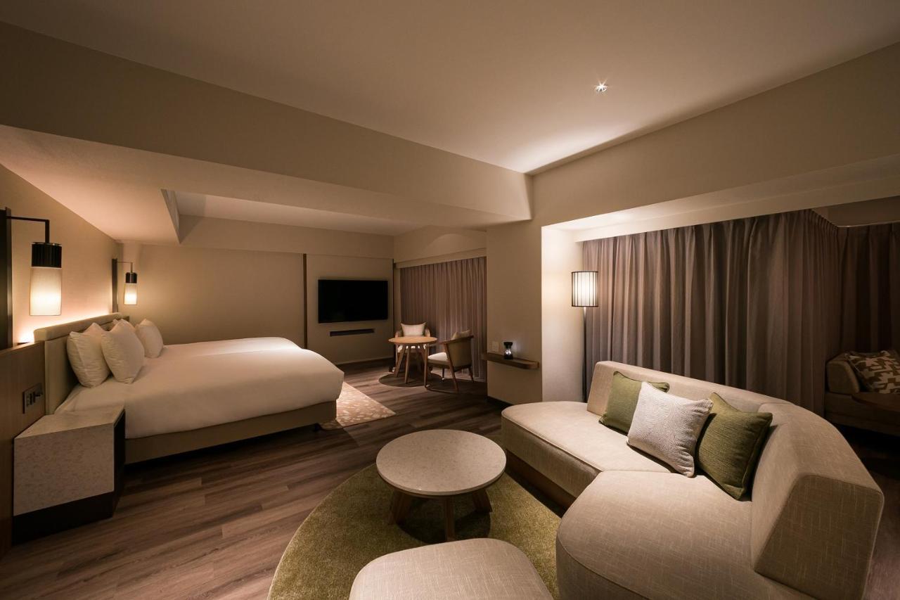 منتجع وسبا أوكيناوا ماريوت ناغُ المظهر الخارجي الصورة A suite at the hotel